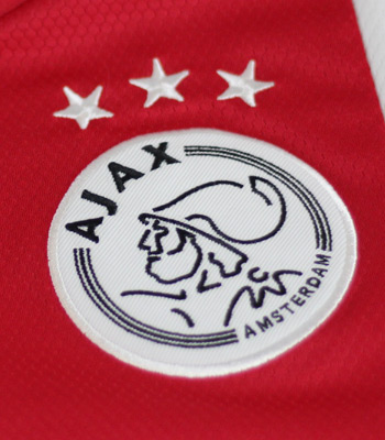 Wanneer mag een club een gouden ster op het shirt plaatsen?